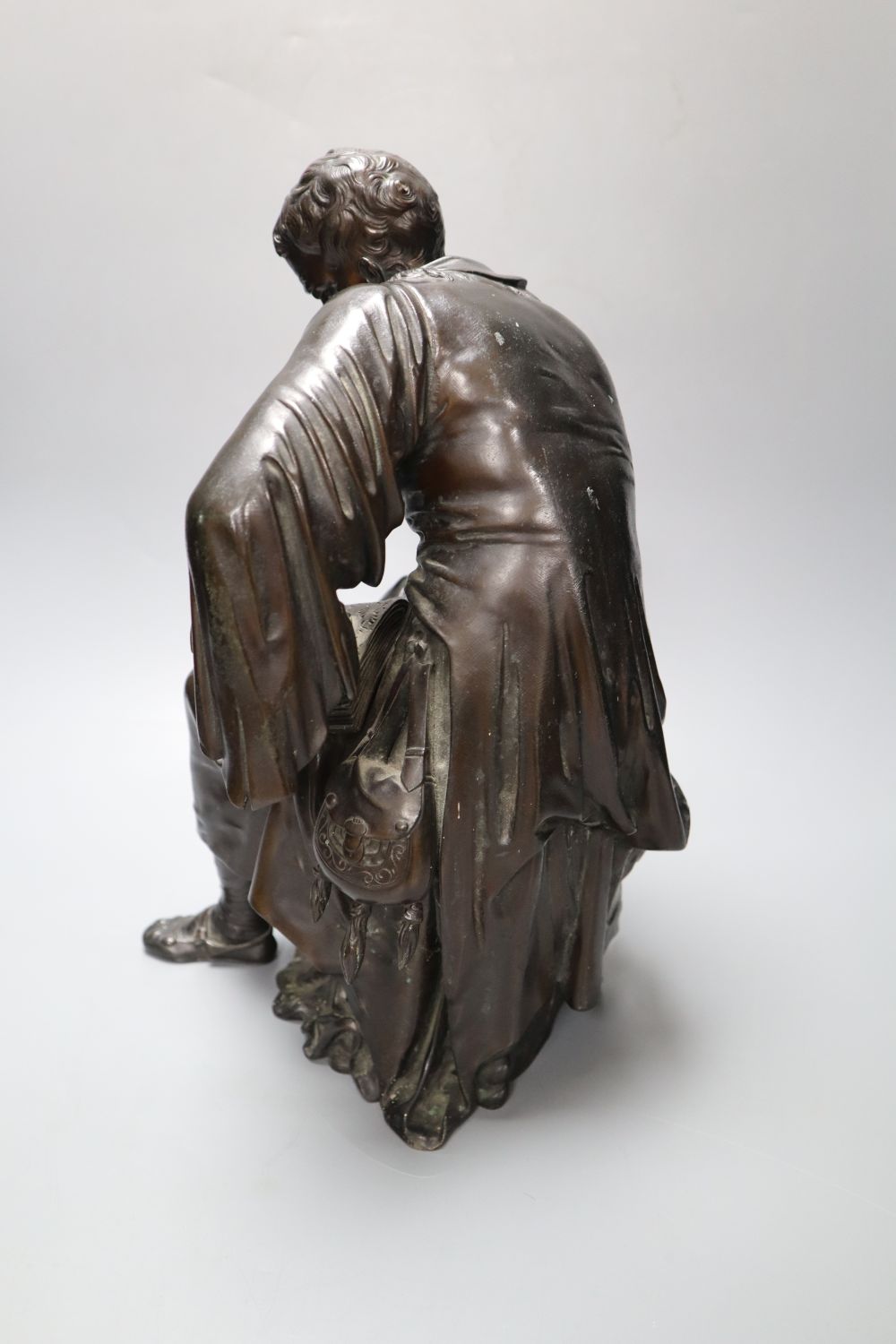 Jean Gout. A bronze model of a scholar painting to a globe, height 34cm